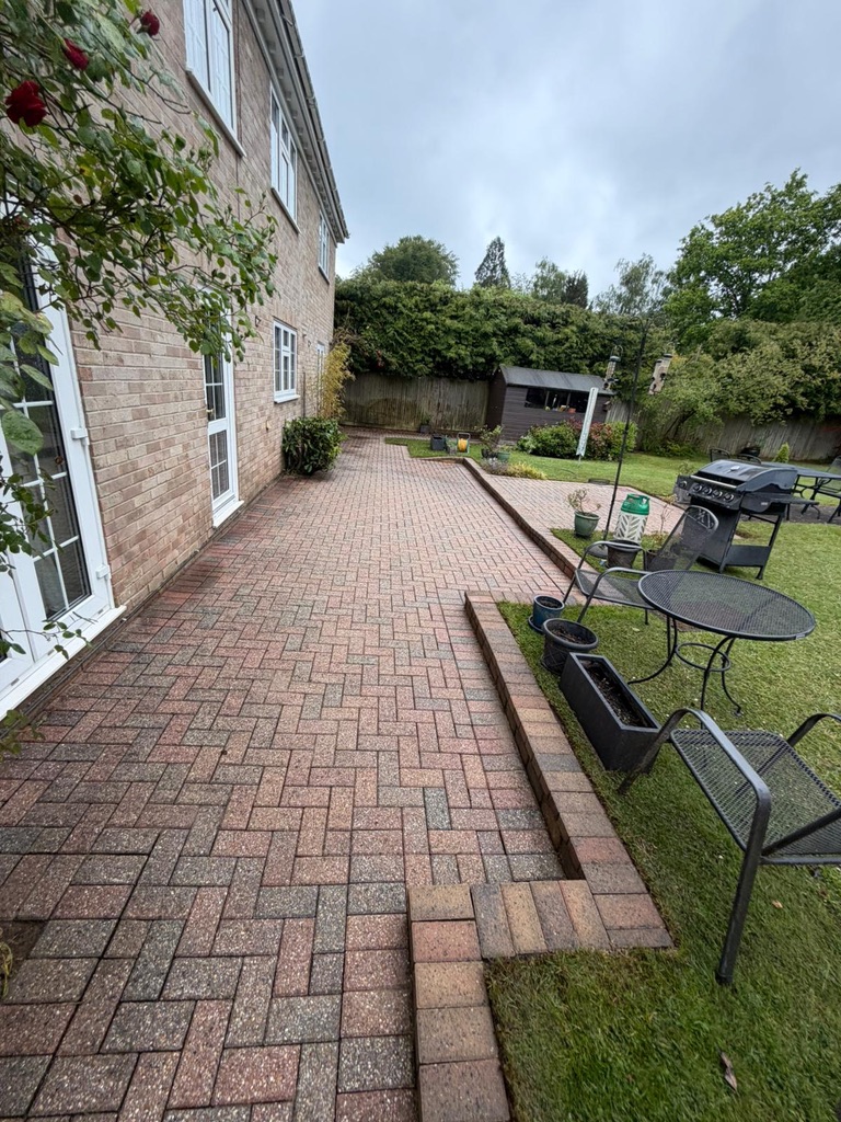 Patio after cleaning with restored block paving