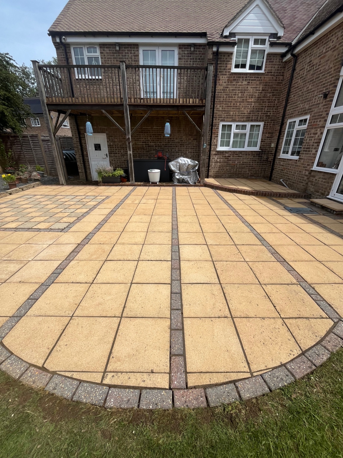 Patio after cleaning with bright restored slabs