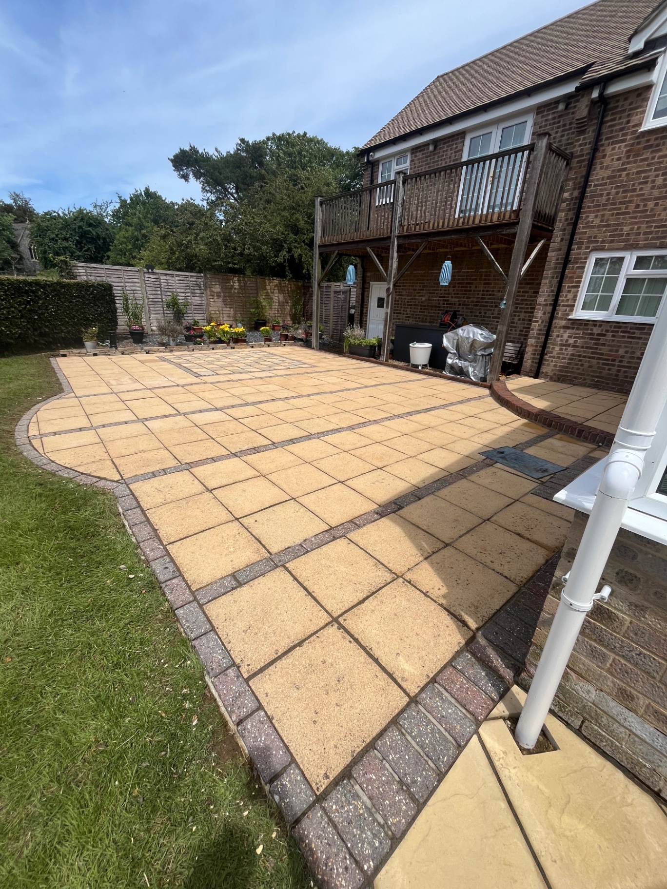 Patio after cleaning with restored slabs